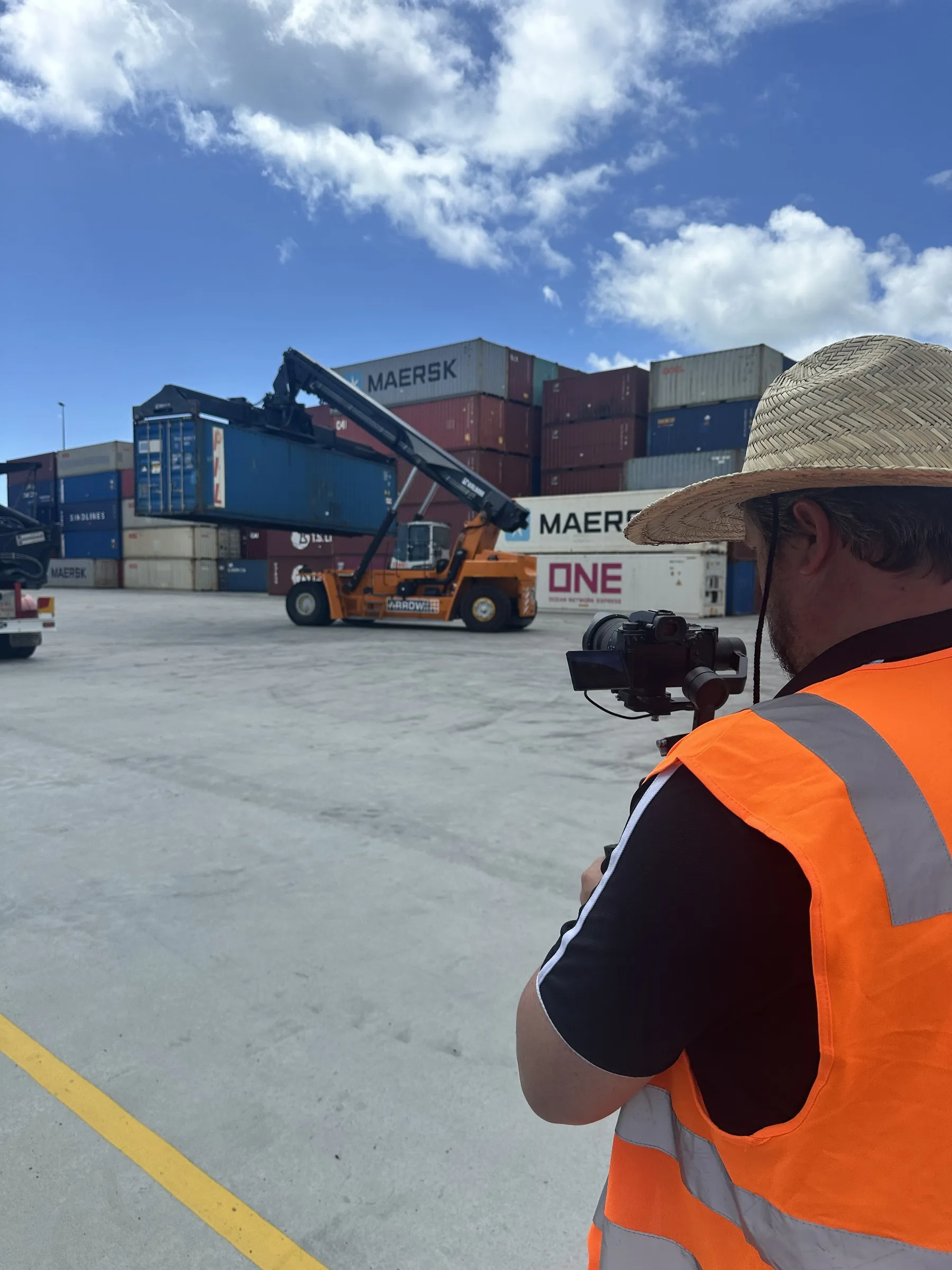 Filming a reach stacker at a container yard